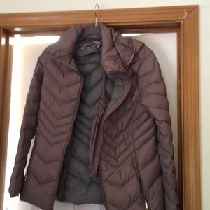 Puffy jacket with hood.